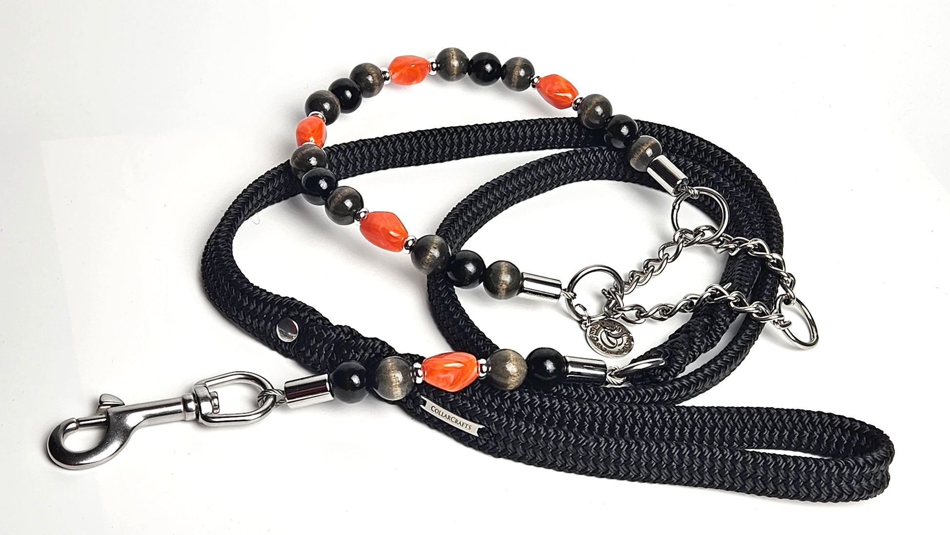 Unbreakable dog jewelry CollarCrafts collar Noir Ember wiith martingale closure, with a matching leash

