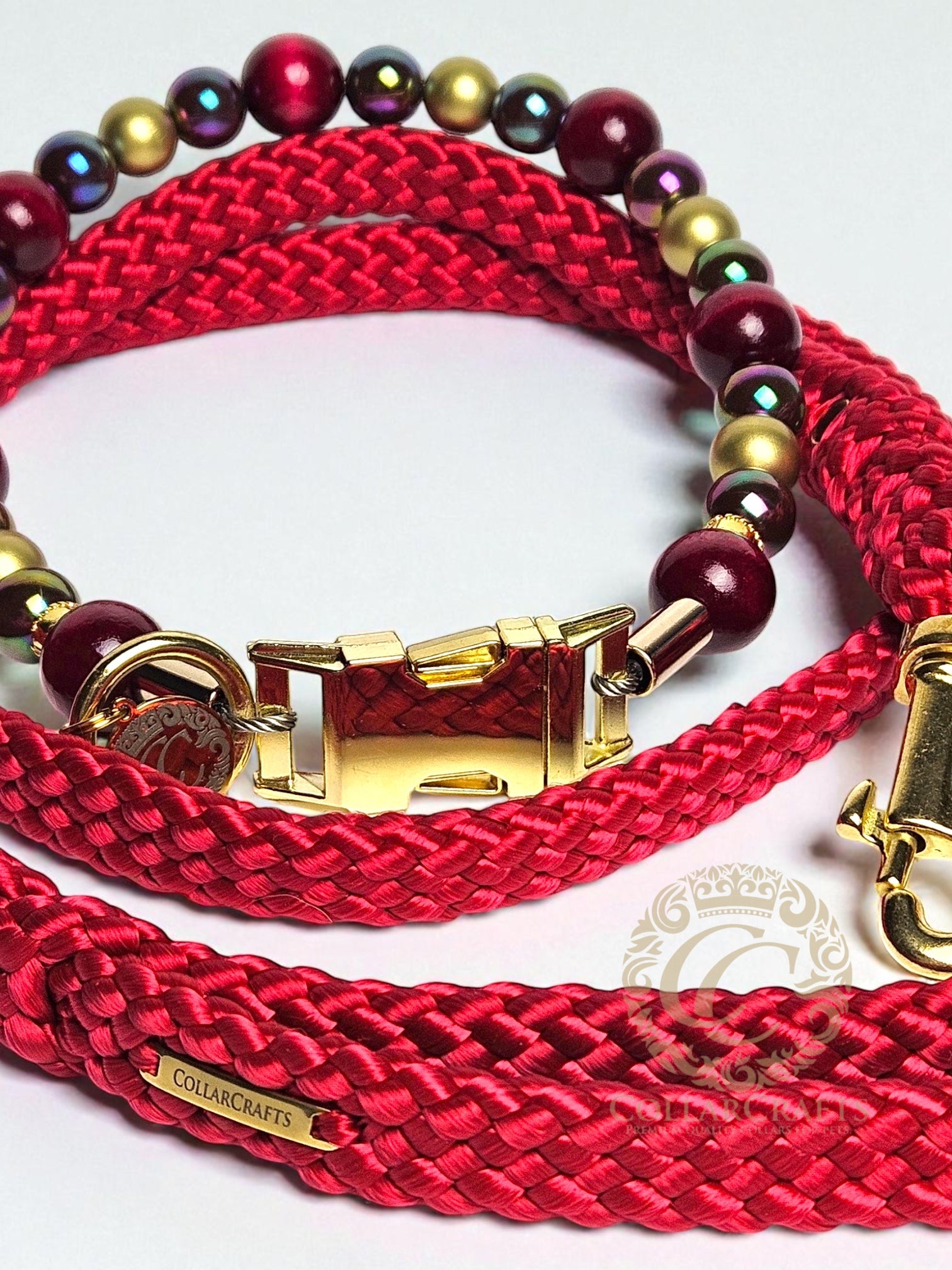 Premium Beaded Burgundy Aurora dog collar with gold hardware and bordeaux, golden and metallic color beads, designed for stylish and leash-safe everyday wear. Buckle closure, matching bordeaux leash