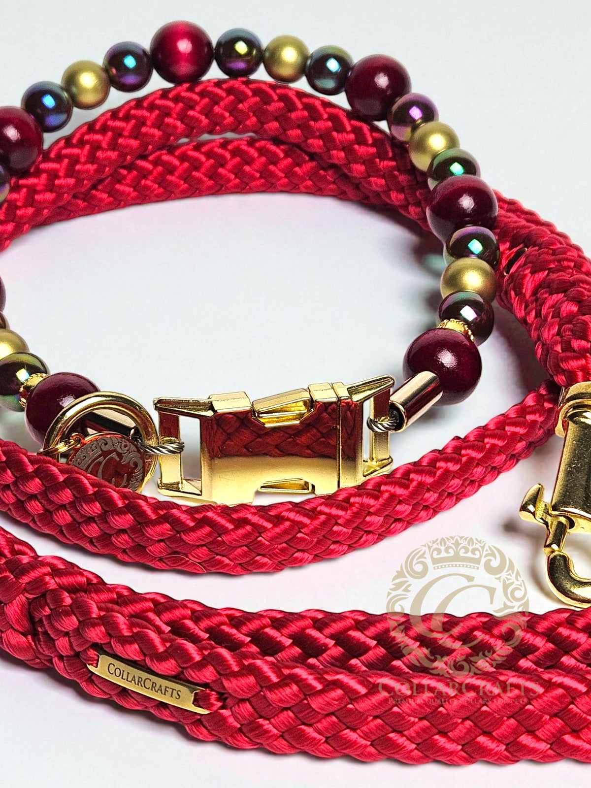 Premium Beaded Burgundy Aurora dog collar with gold hardware and bordeaux, golden and metallic color beads, designed for stylish and leash-safe everyday wear. Buckle closure, matching bordeaux leash